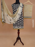 Mul mul cotton dress material black and mustard shade with allover floral butta prints and bottom & chiffon dupatta