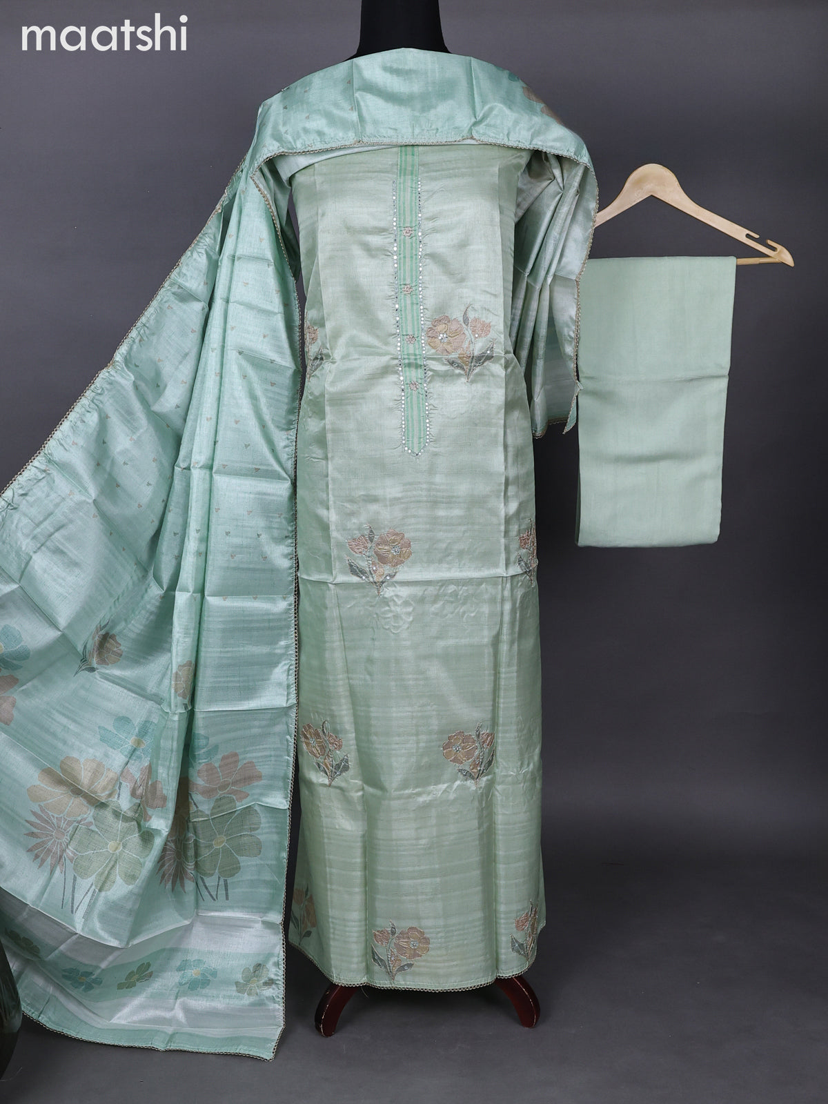 Semi tussar dress material mild pista green with allover floral prints & simple neck pattern and bottom & printed dupatta