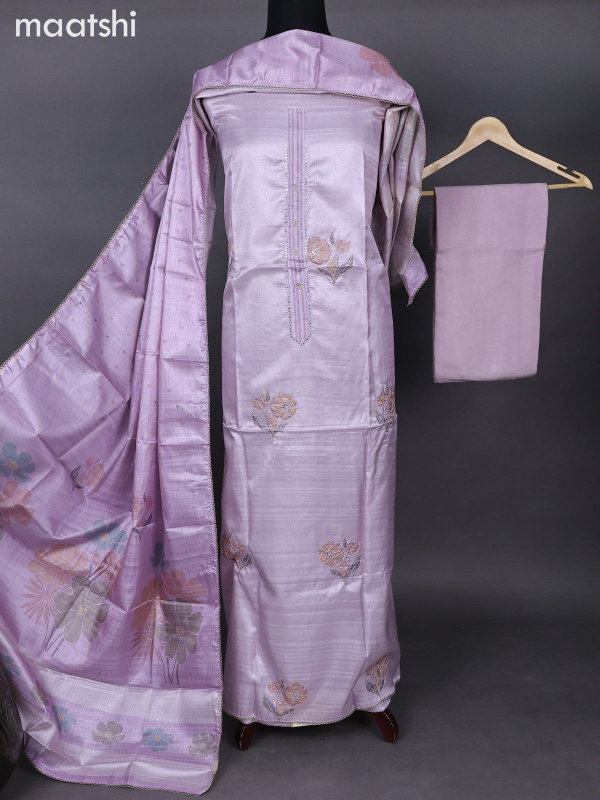 Semi tussar dress material pastel lavender with allover floral prints & simple neck pattern and bottom & printed dupatta