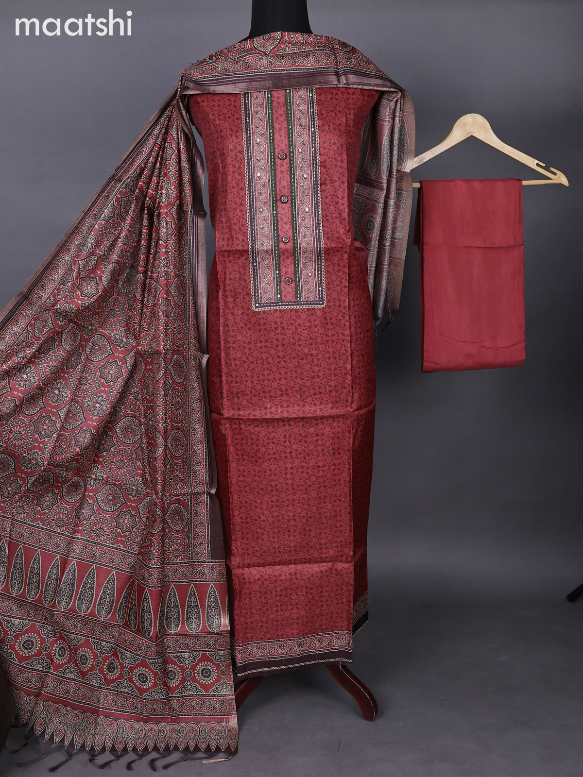 Semi tussar dress material rustic maroon with allover prints & lace patch work neck pattern and bottom & ajrakh printed dupatta
