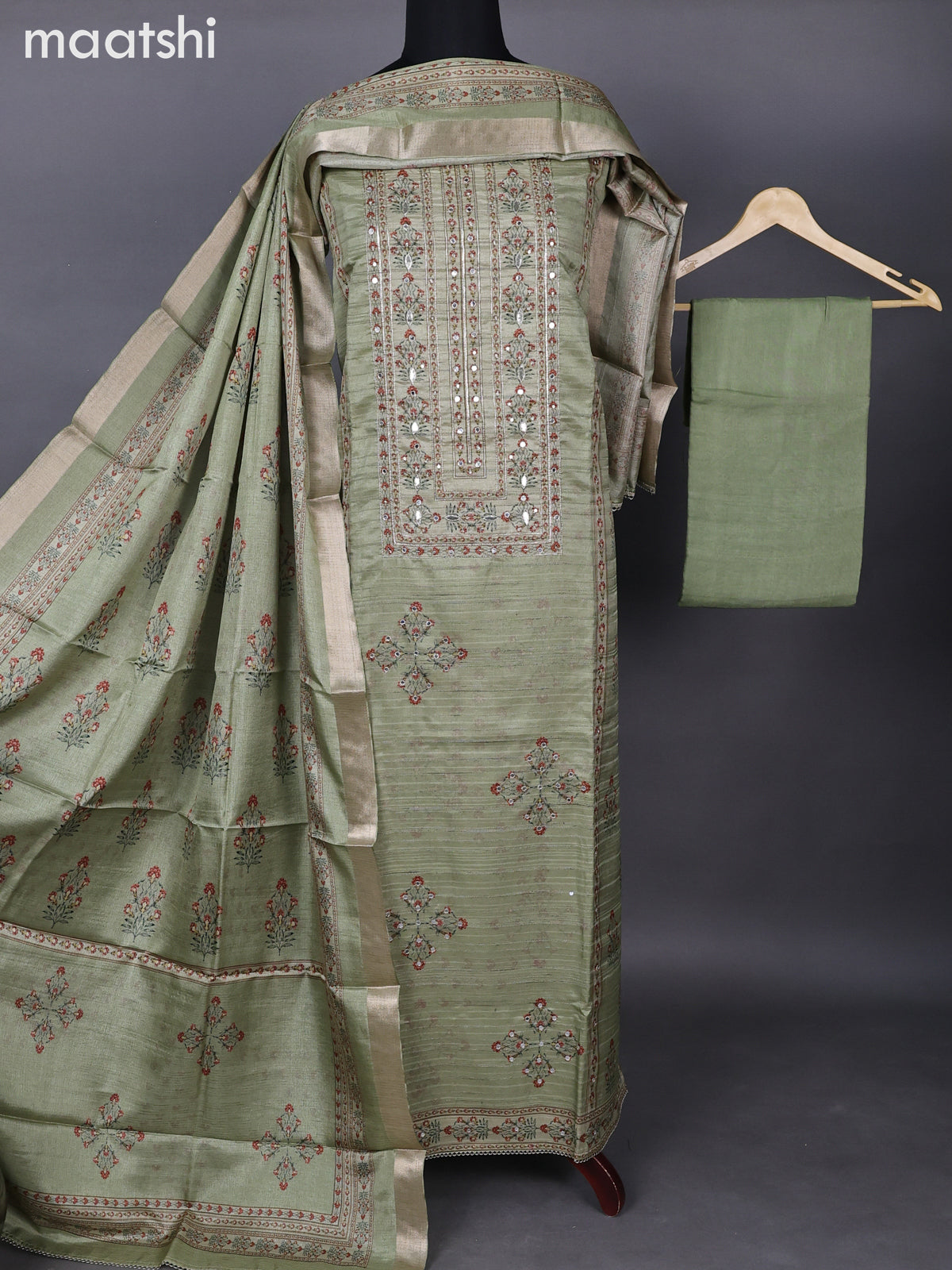 Semi tussar dress material pastel green with floral butta prints & jute finish and bottom & printed dupatta