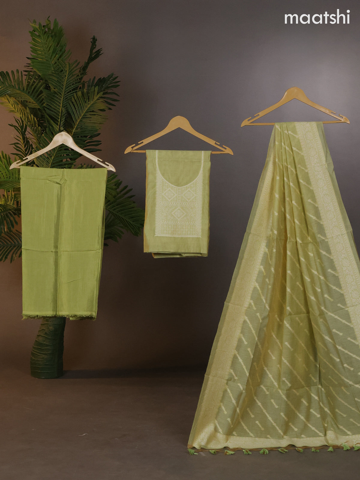 Munga cotton dress material mild pista green with thread woven buttas & simple neck pattern and bottom & thread woven dupatta