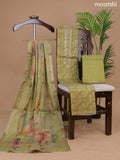 Semi tussar dress material lime green with allover prints & gota patti lace work neck pattern and bottom & floral printed dupatta