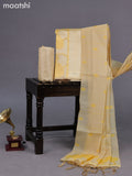 Semi tussar dress material yellow shade with thread & zari floral weaves and bottom & dupatta