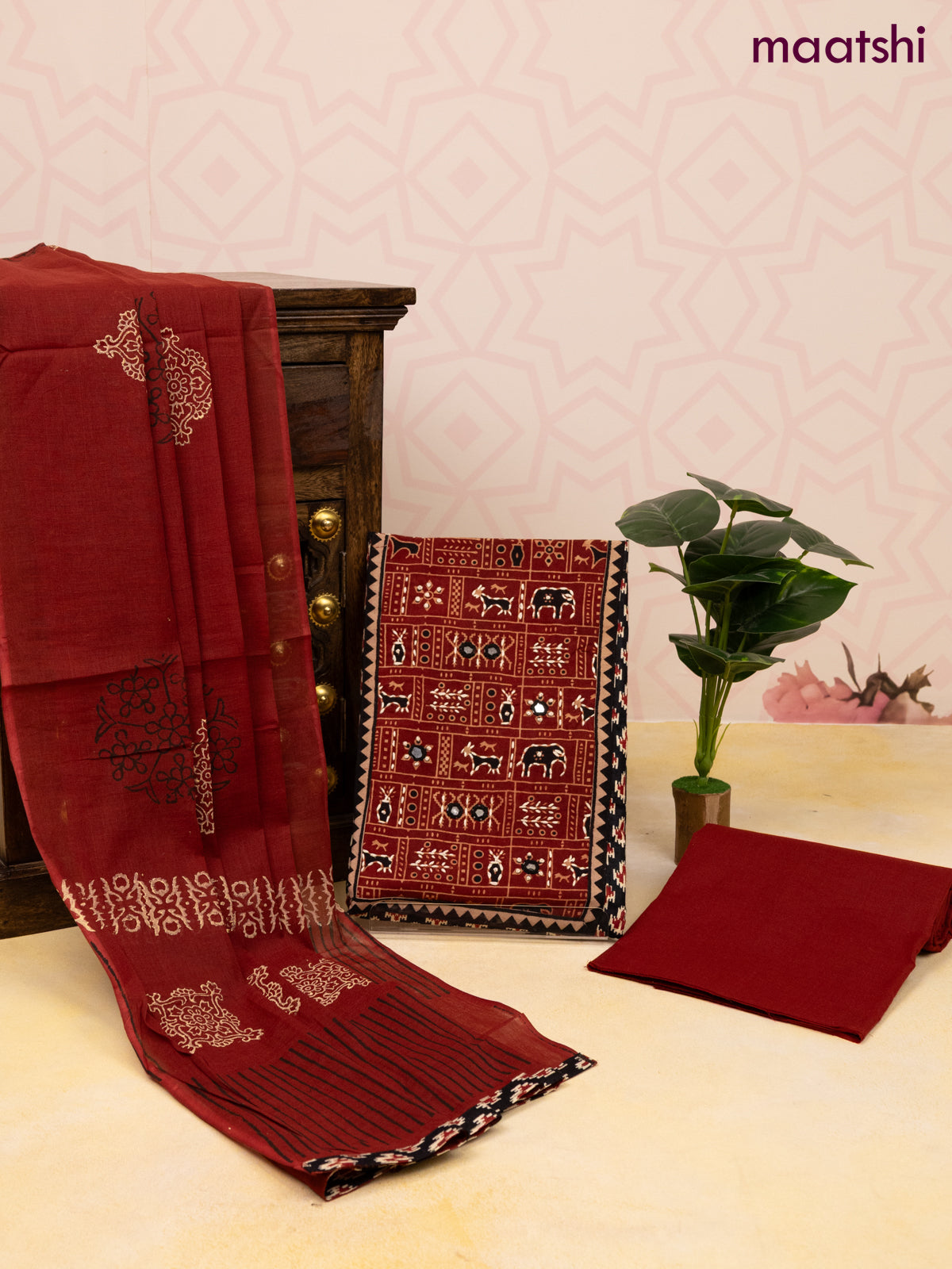 Cotton dress material black and maroon with allover ikat butta prints & patch work neck pattern and bottom & dupatta
