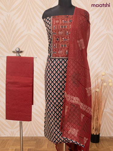 Cotton dress material black and maroon with allover ikat butta prints & patch work neck pattern and bottom & dupatta