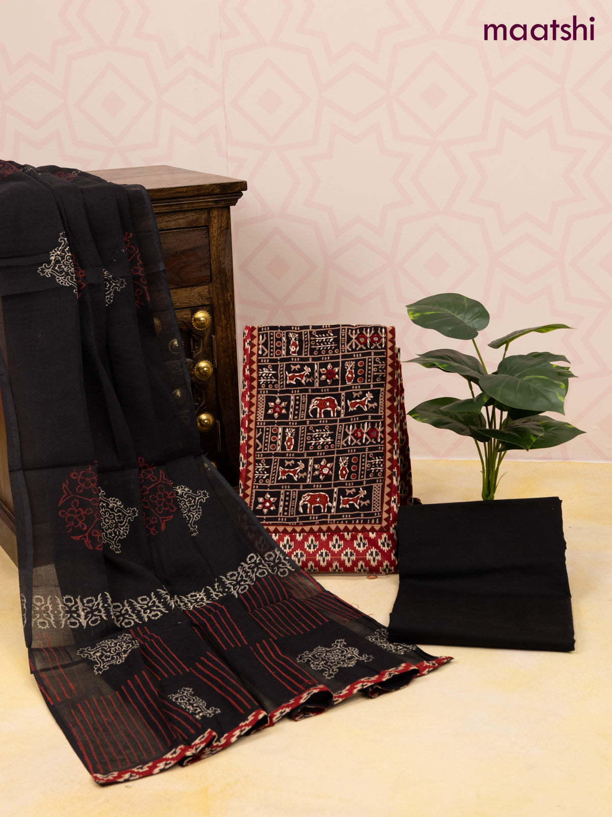 Cotton dress material maroon and black with allover ikat butta prints & patch work neck pattern and bottom & dupatta