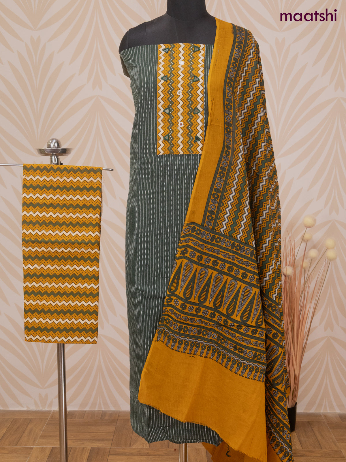 Cotton dress material dark green and mustard yellow with allover thread weaves & patch work neck pattern and bottom & dupatta