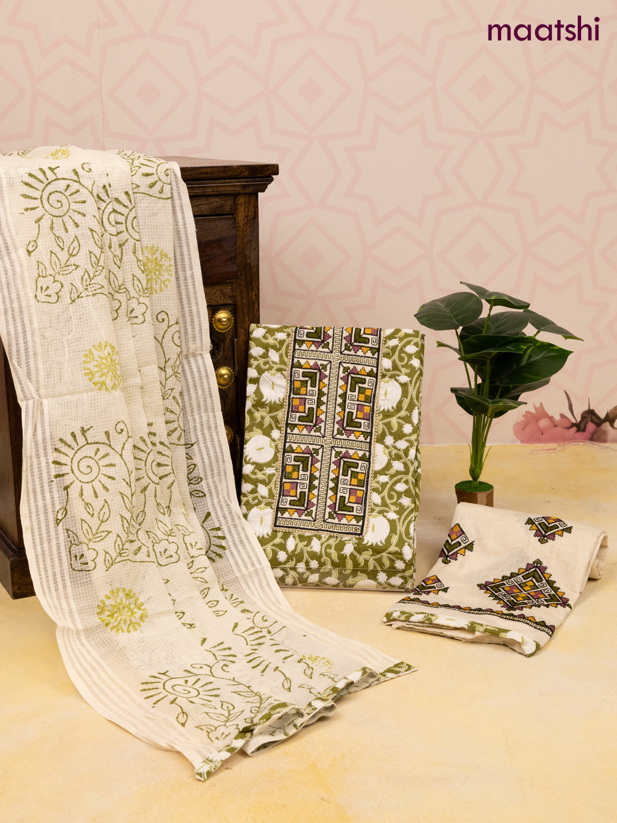 Cotton dress material green and off white with allover prints & patch work neck pattern and bottom & dupatta