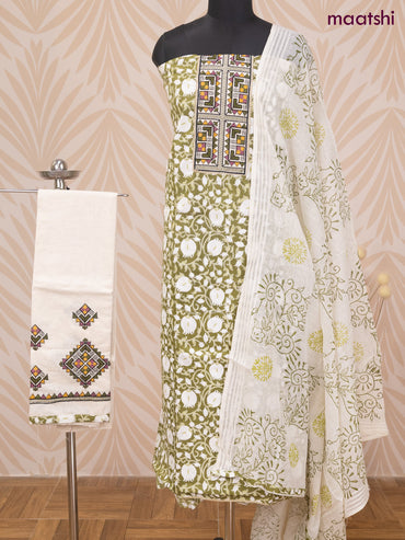 Cotton dress material green and off white with allover prints & patch work neck pattern and bottom & dupatta