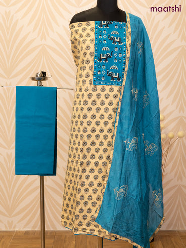 Cotton dress material sandal and cs blue with allover butta prints & patch work neck pattern and bottom & dupatta
