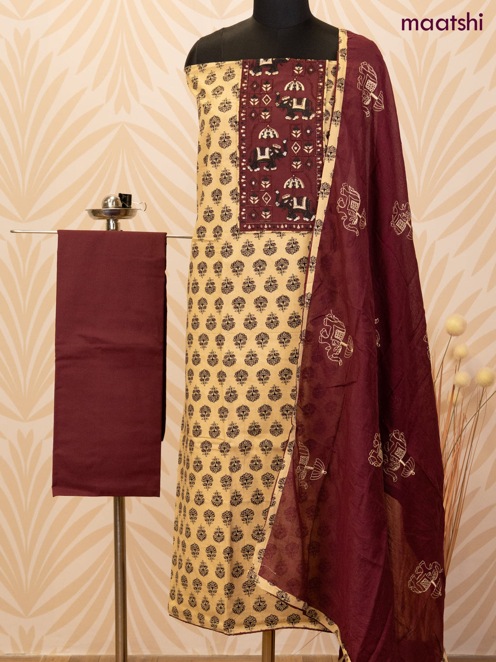 Cotton dress material sandal and deep maroon with allover butta prints & patch work neck pattern and bottom & dupatta