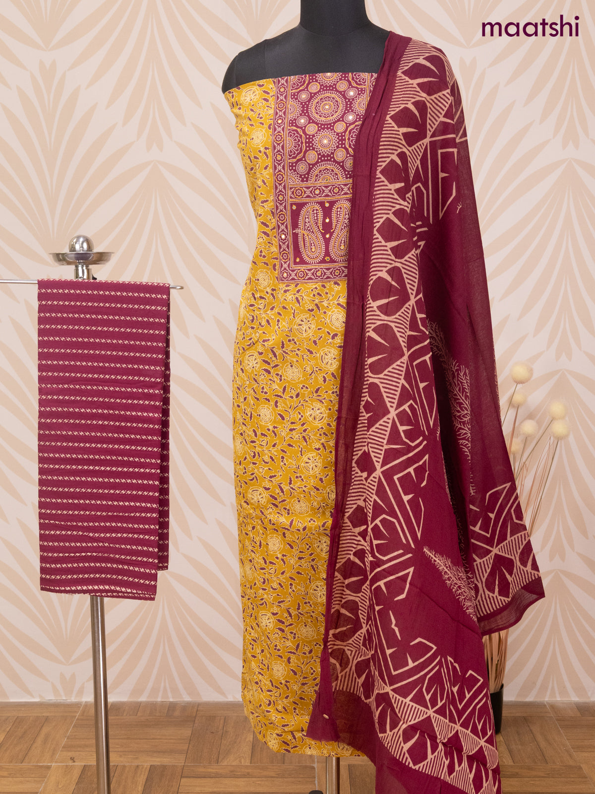 Cotton dress material mustard yellow and maroon with allover prints & patch work neck pattern and bottom & dupatta
