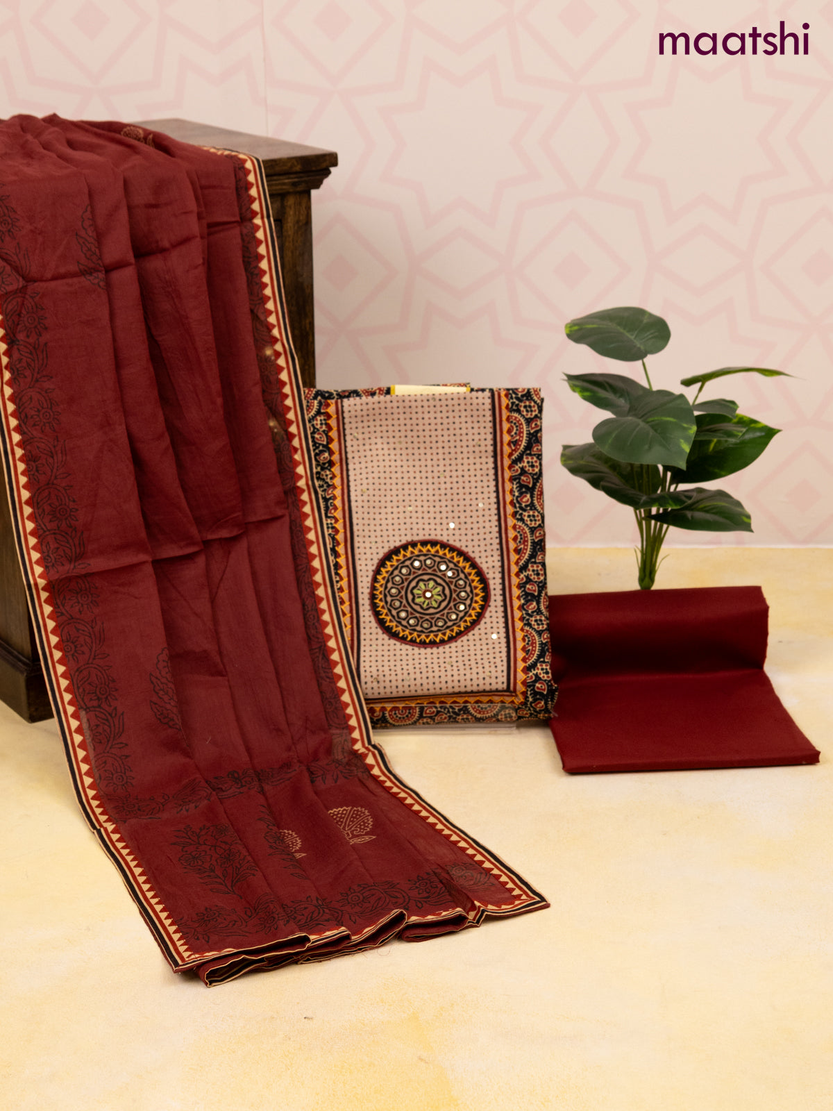 Cotton dress material black and maroon with allover ajrakh prints & patch work neck pattern and bottom & dupatta