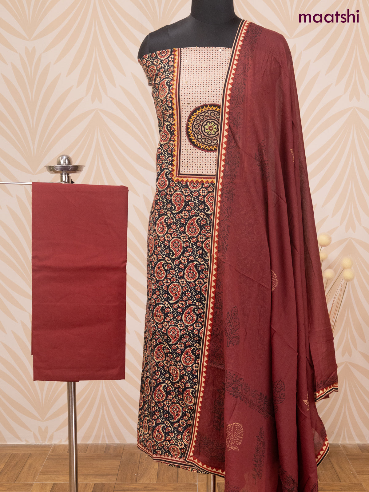 Cotton dress material black and maroon with allover ajrakh prints & patch work neck pattern and bottom & dupatta