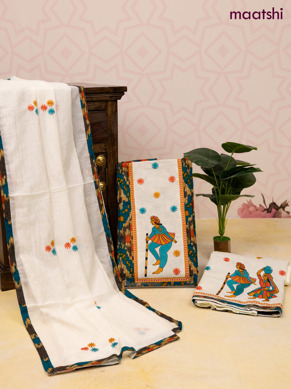 Cotton dress material peacock green and off white with allover ikat prints & patch work neck pattern and bottom & dupatta
