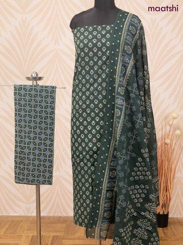 Cotton dress material dark green with allover butta prints and bottom & dupatta