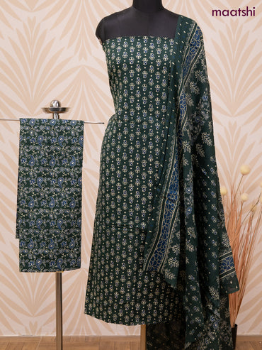 Cotton dress material dark green with allover butta prints and bottom & dupatta