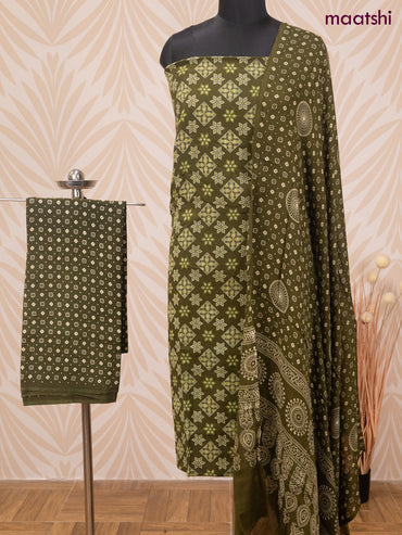 Cotton dress material olive green with allover butta prints and bottom & dupatta