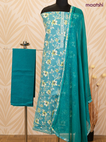 Rayon dress material teal blue with allover floral prints & simple neck pattern and bottom & chiffon dupatta