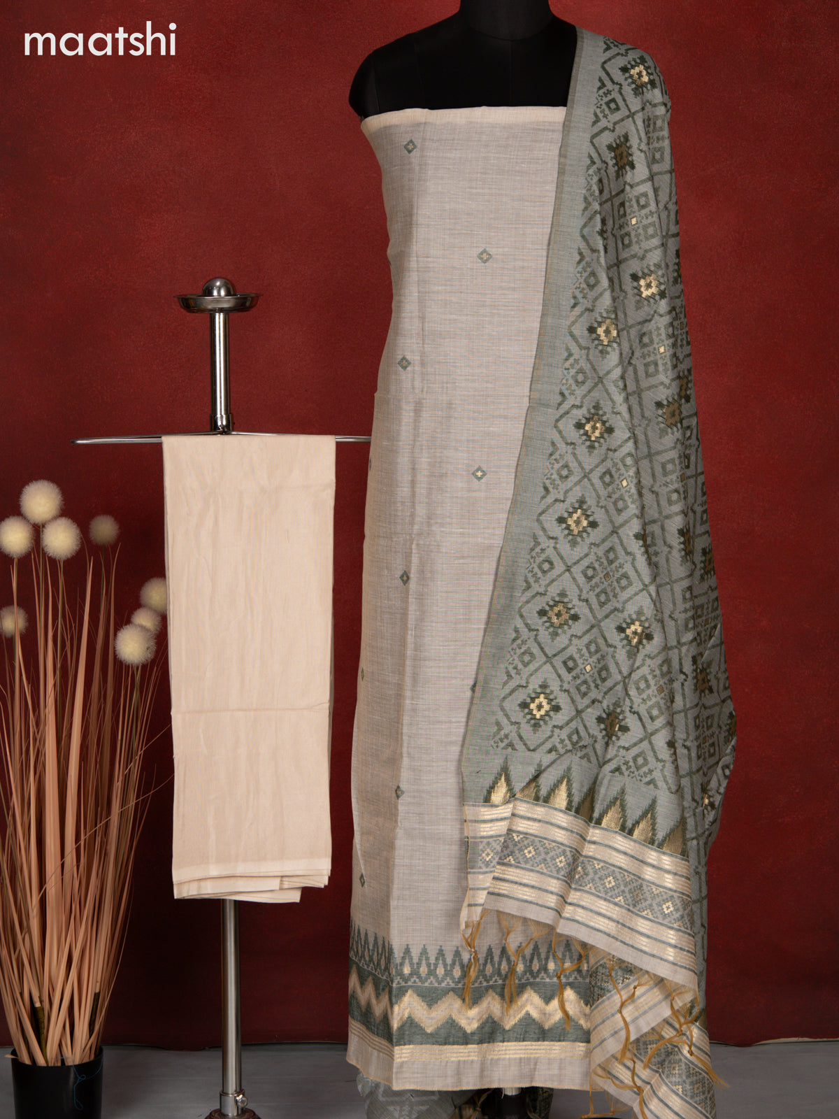 Munga dress material cream and sap green with thread & zari woven buttas and bottom & dupatta