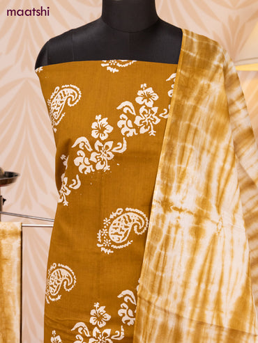 Batik cotton dress material dark mustard and off white with batik prints and bottom & dupatta