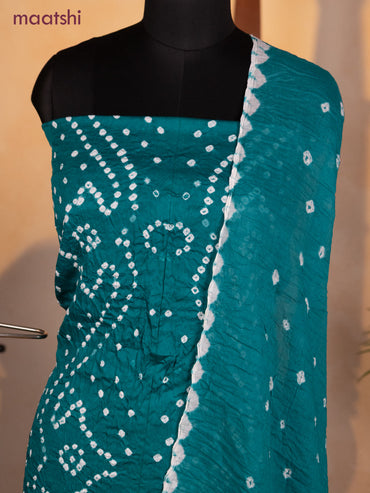 Bandhani dress materials teal green with allover bandhani prints and bottom & dupatta