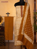 Bandhani dress materials off white and dark mustard with shibori prints & mirror embroidery work neck pattern and bottom & dupatta
