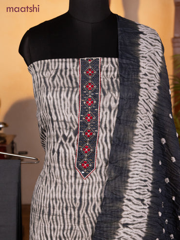 Bandhani dress materials off white and grey with shibori prints & mirror embroidery work neck pattern and bottom & dupatta