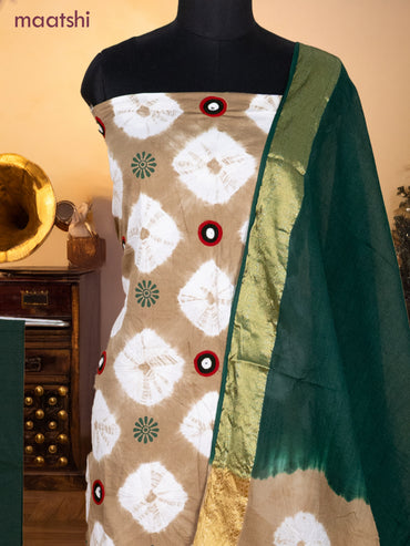 Bandhani dress materials beige and peacock green with tie & dye prints embroidery work and bottom & dupatta