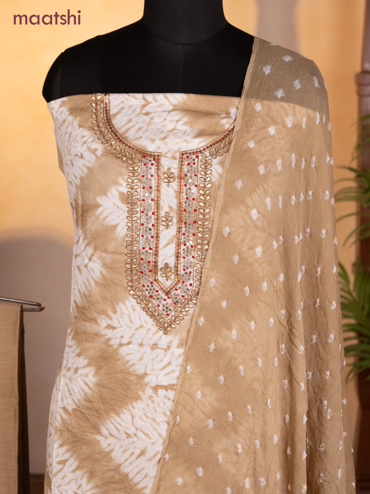 Bandhani dress materials beige with shibori prints & zardosi work neck pattern and bottom & chiffon dupatta