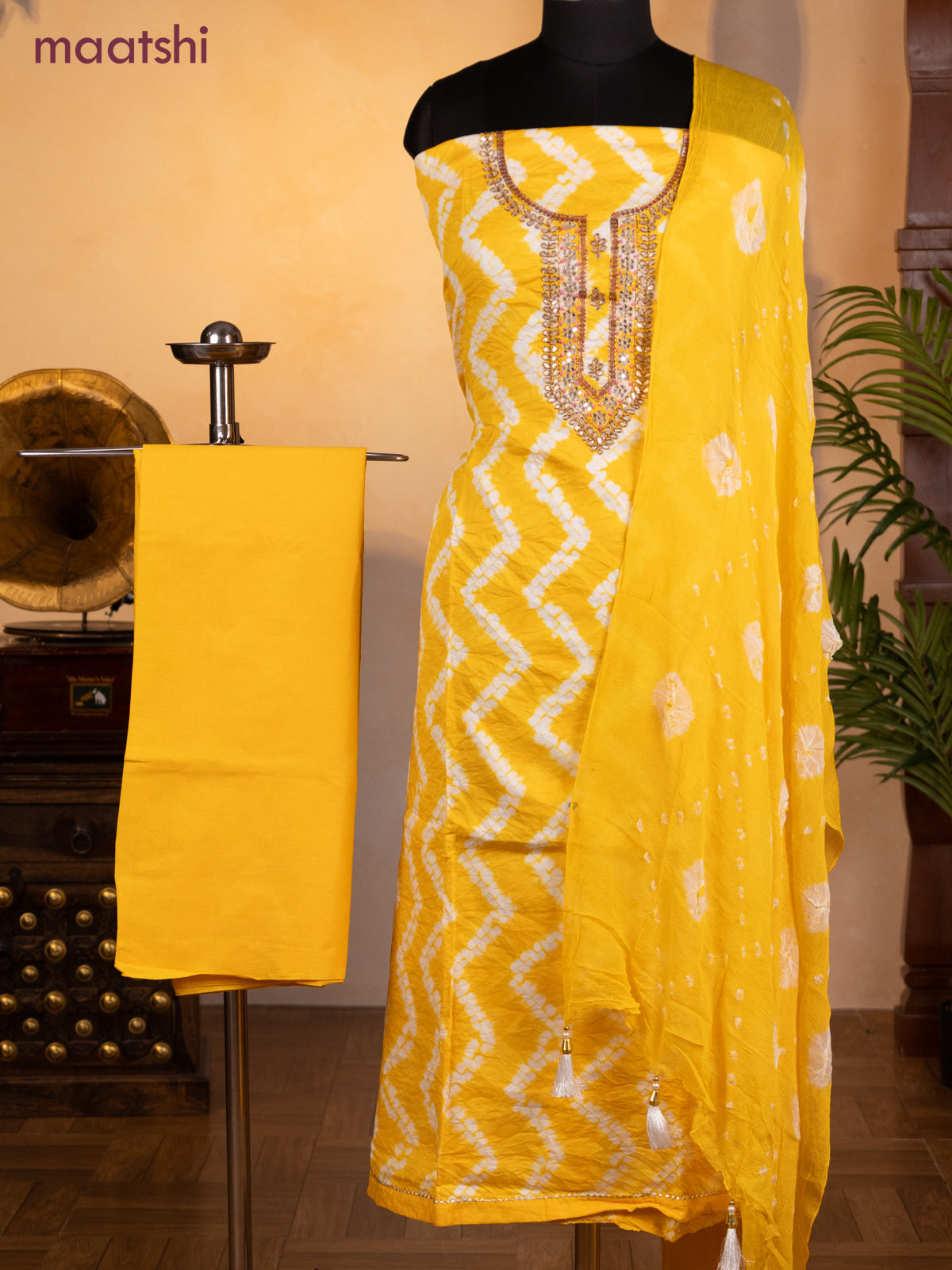 Bandhani dress materials mango yellow with shibori prints & zardosi work neck pattern and bottom & chiffon dupatta
