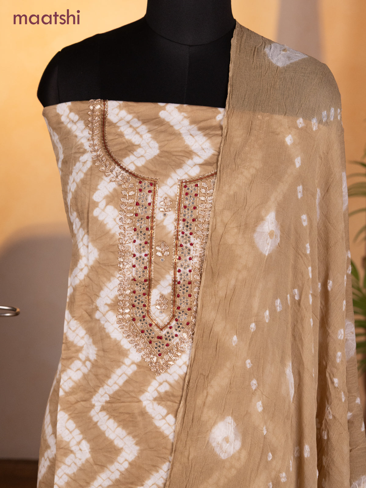 Bandhani dress materials beige with shibori prints & zardosi work neck pattern and bottom & chiffon dupatta