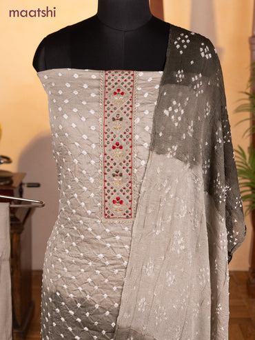 Bandhani dress materials pastel grey with bandhani prints & zardosi mirror work neck pattern and bottom & chiffon dupatta