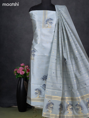 Semi tussar dress material pastel blue with zari woven buttas & simple zari neck pattern and bottom & dupatta