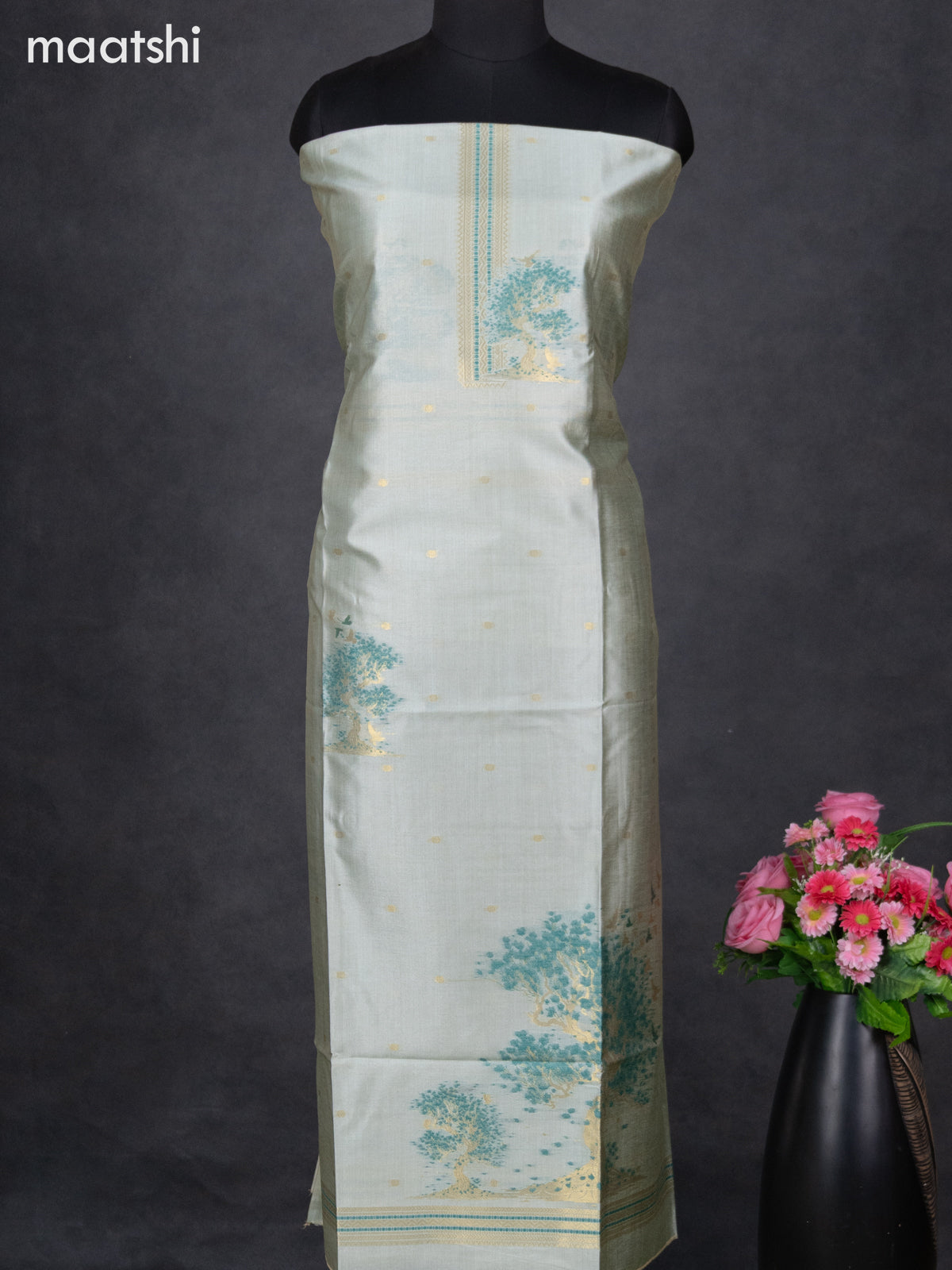 Semi tussar dress material pastel green with thread & zari woven floral weaves and bottom & dupatta