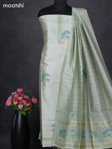 Semi tussar dress material pastel green with thread & zari woven floral weaves and bottom & dupatta