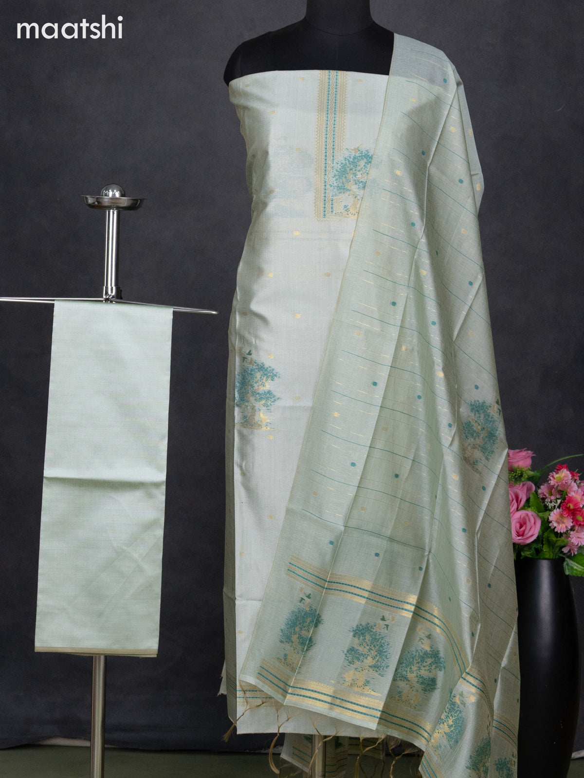 Semi tussar dress material pastel green with thread & zari woven floral weaves and bottom & dupatta