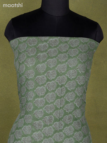 Linen cotton dress material pastel green shade with allover floral butta prints and bottom & dupatta