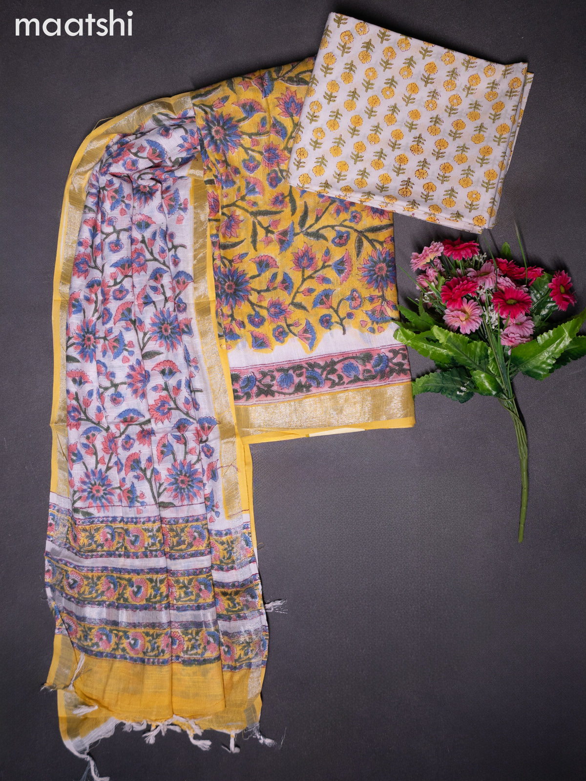 Linen cotton dress material yellow and off white with allover floral prints and bottom & dupatta