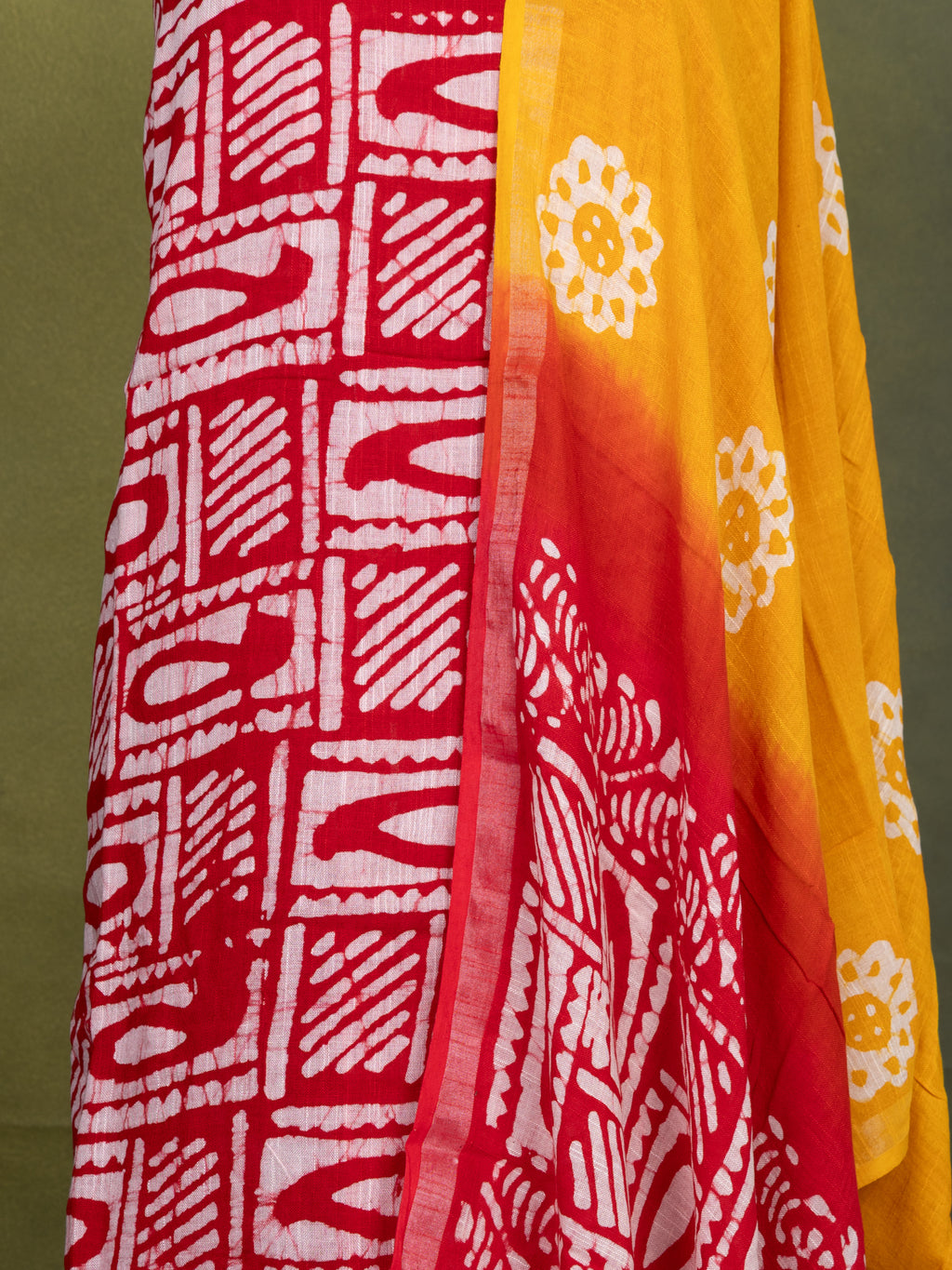Linen cotton dress material red and mango yellow with allover batik prints and bottom & dupatta