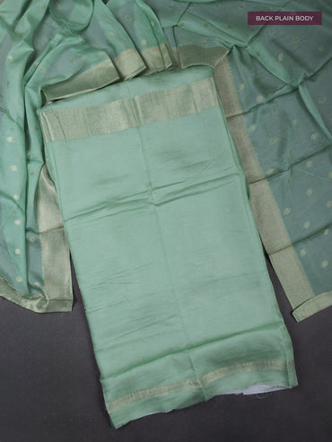 Banarasi silk dress material pastel green with allover zari brocade weaves and dupatta & without bottom