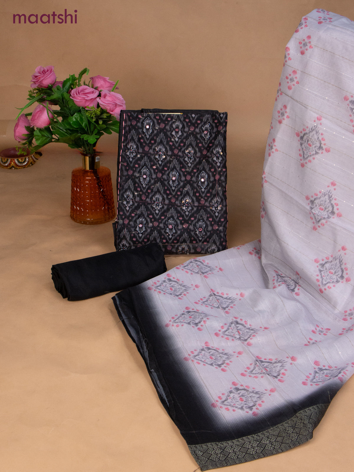 Semi tussar dress material black and off white with prints & sequin beaded work neck pattern and bottom & dupatta