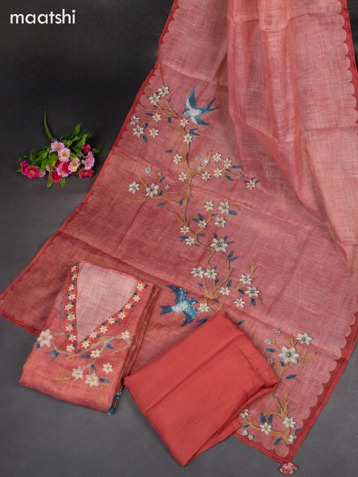 Linen tissue dress material peach shade with french knot work & embroidery v neck pattern and bottom & french knot work dupatta