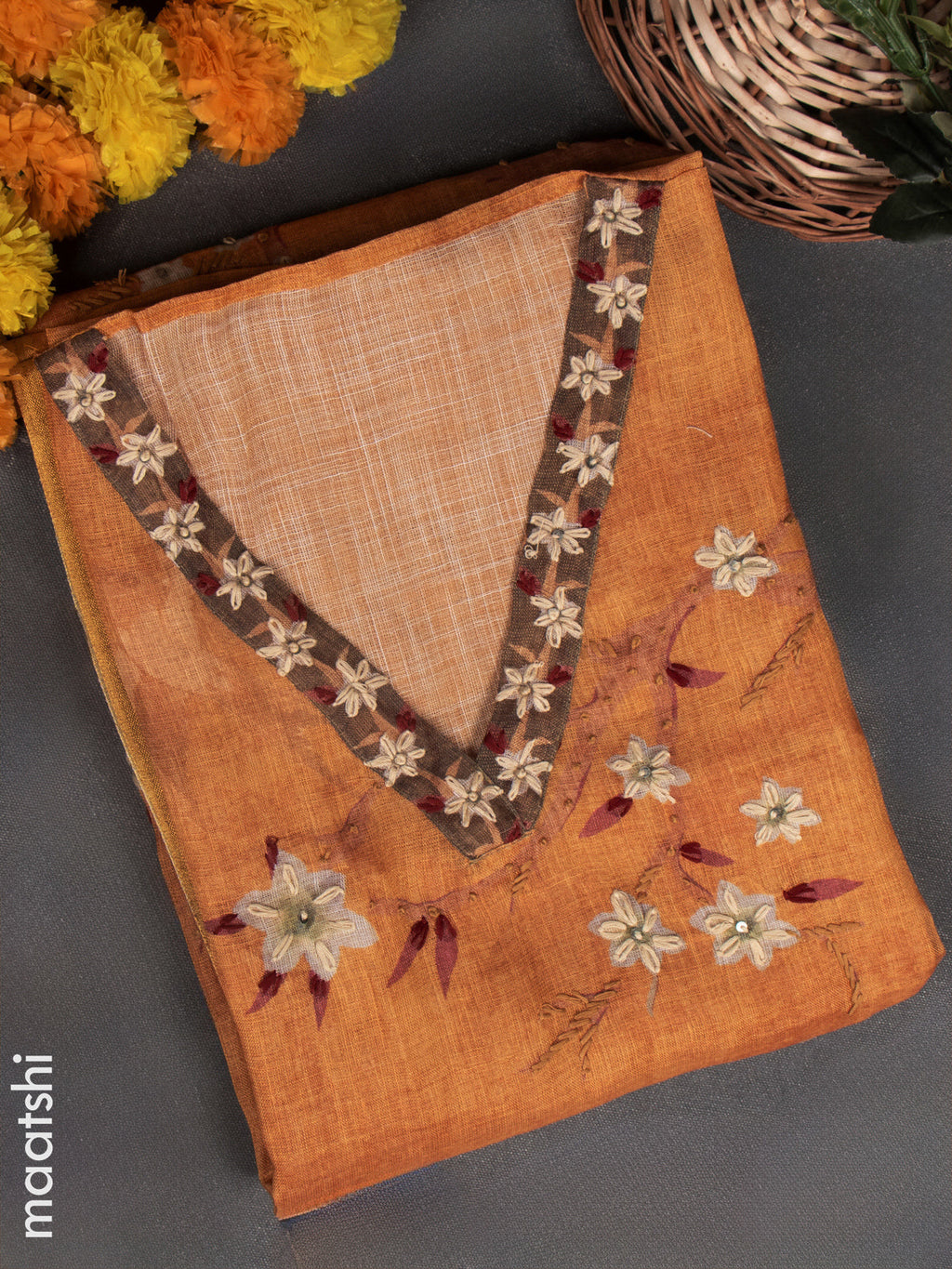 Linen tissue dress material mustard shade with french knot work & embroidery v neck pattern and bottom & french knot work dupatta