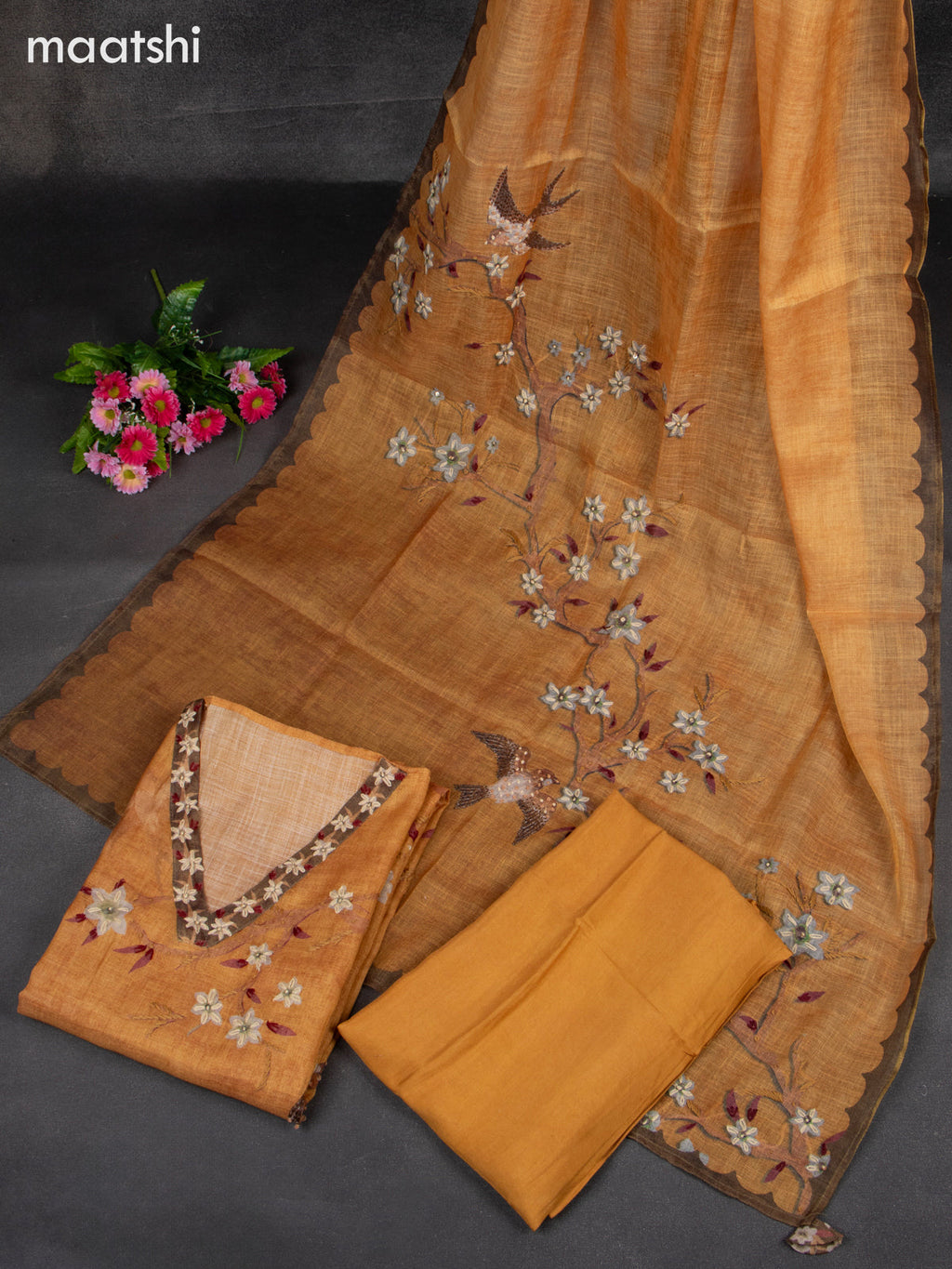 Linen tissue dress material mustard shade with french knot work & embroidery v neck pattern and bottom & french knot work dupatta