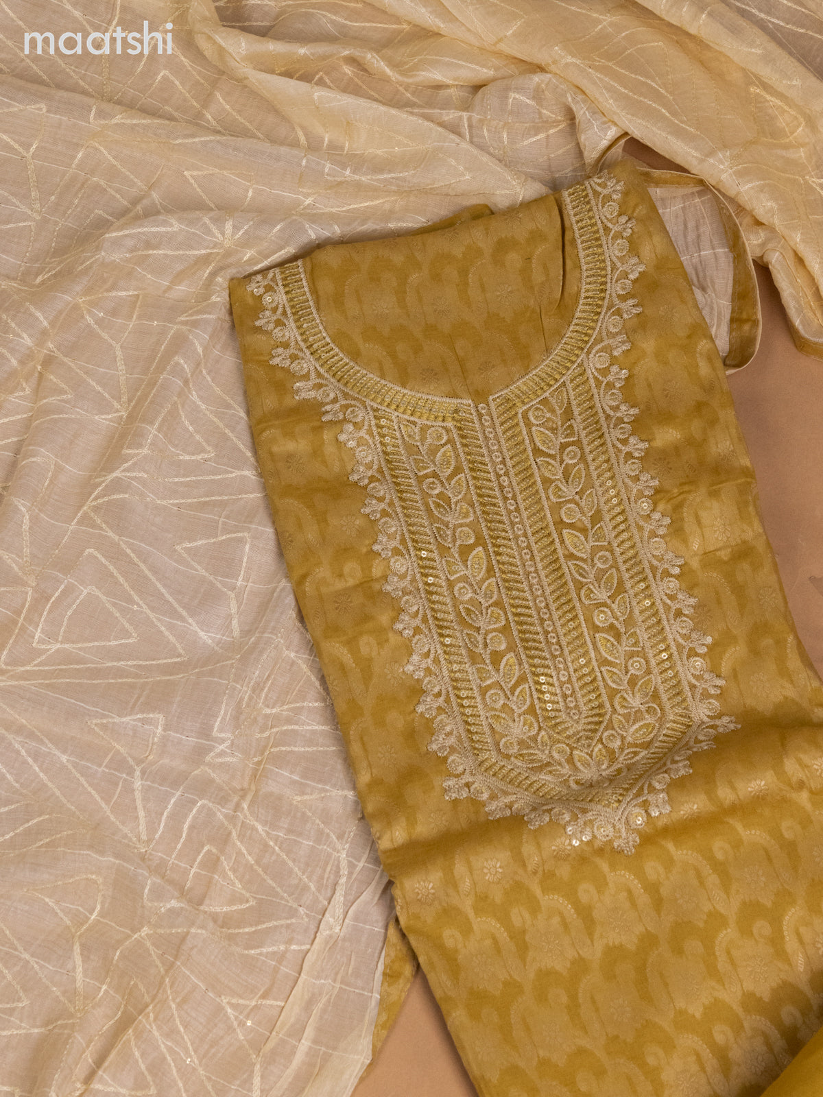 Cotton dress material mustard yellow and cream with allover thread weaves & sequin embroidery work neck pattern and bottom & dupatta