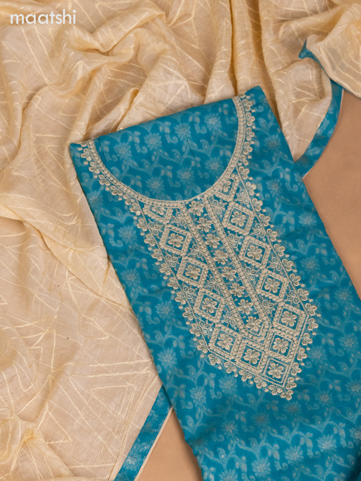Cotton dress material teal blue and cream with allover thread weaves & sequin embroidery work neck pattern and bottom & dupatta