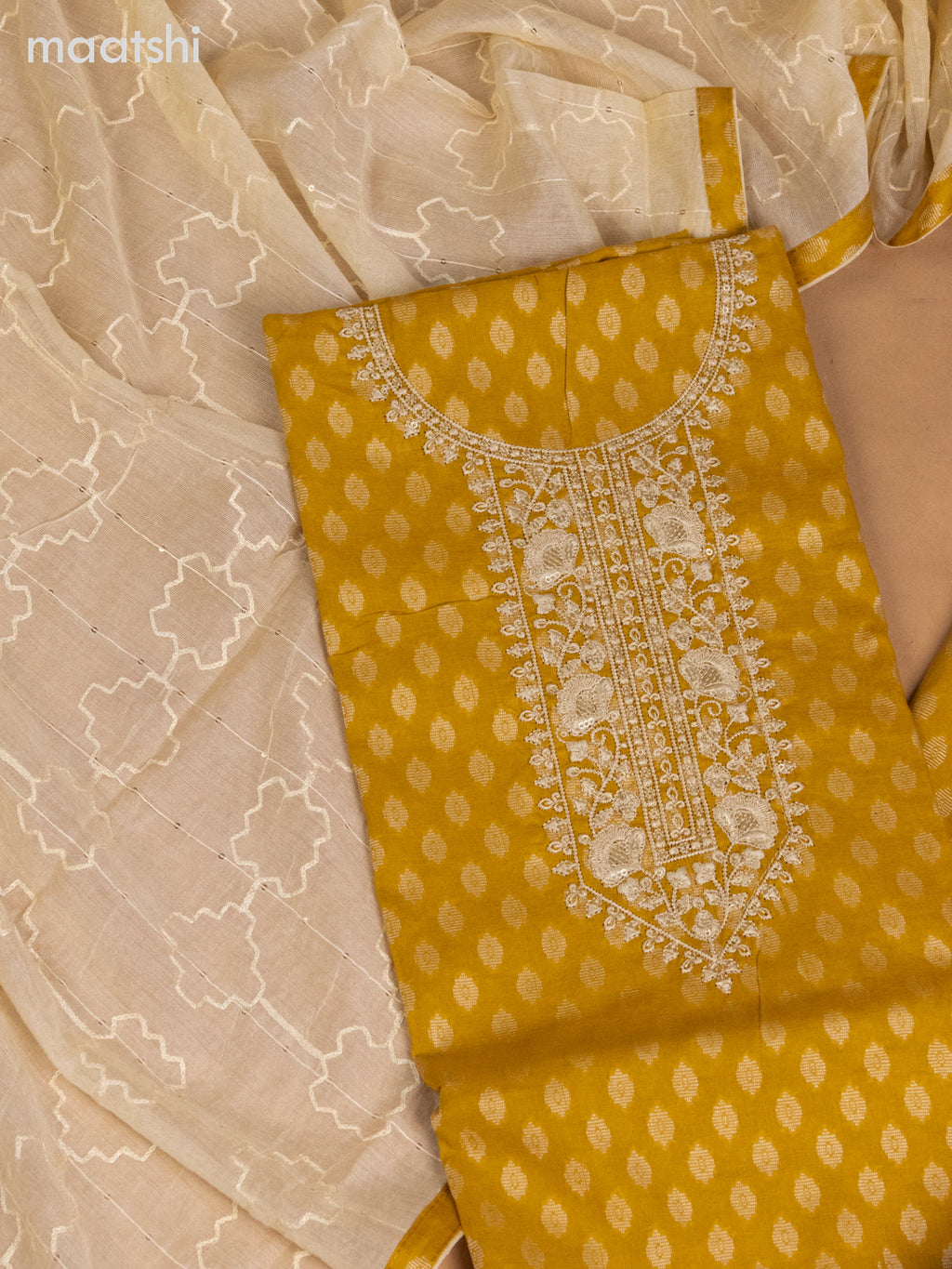 Cotton dress material mustard yellow and cream with allover buttas & sequin embroidery work neck pattern and bottom & dupatta