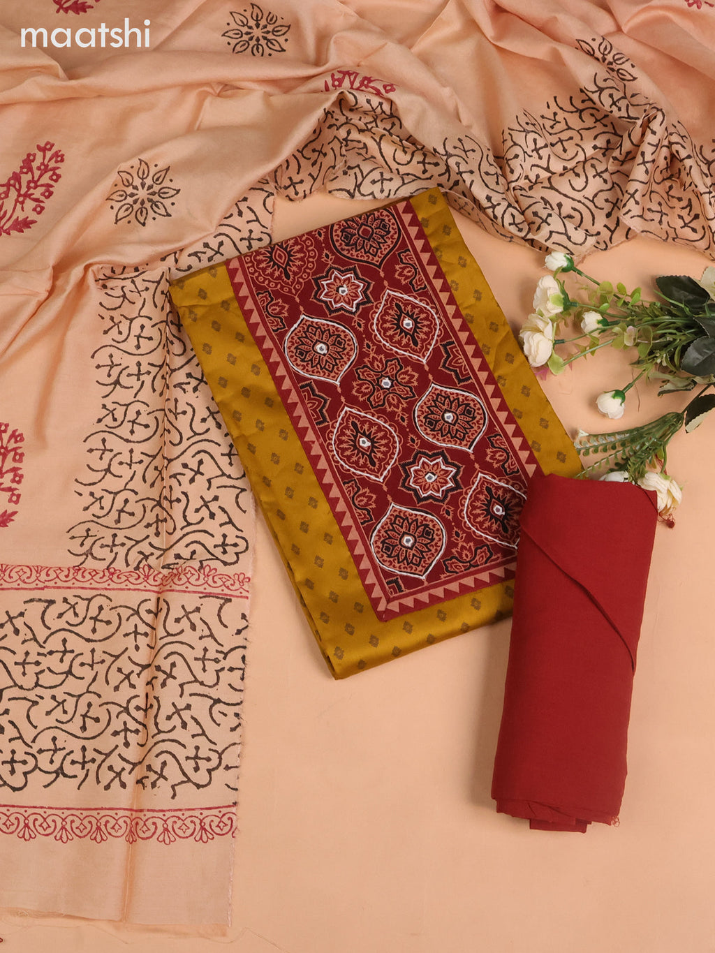 Cotton dress material dark mustard and maroon with allover buttas prints & ajrakh patch work neck pattern and bottom & dupatta